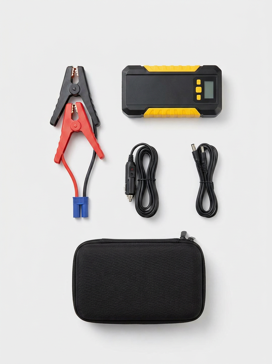 Complete unboxing: jump starter unit, red & black clamps, USB & DC cables, and hard carry case